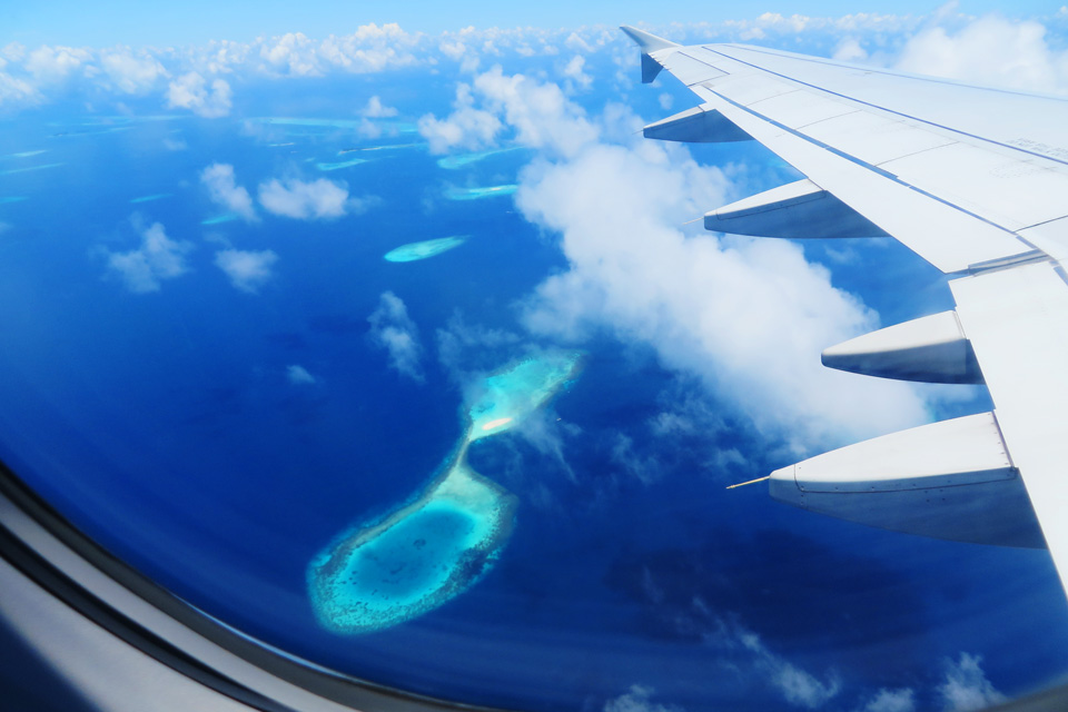 Magnificent view at the Maldives from the plane window 