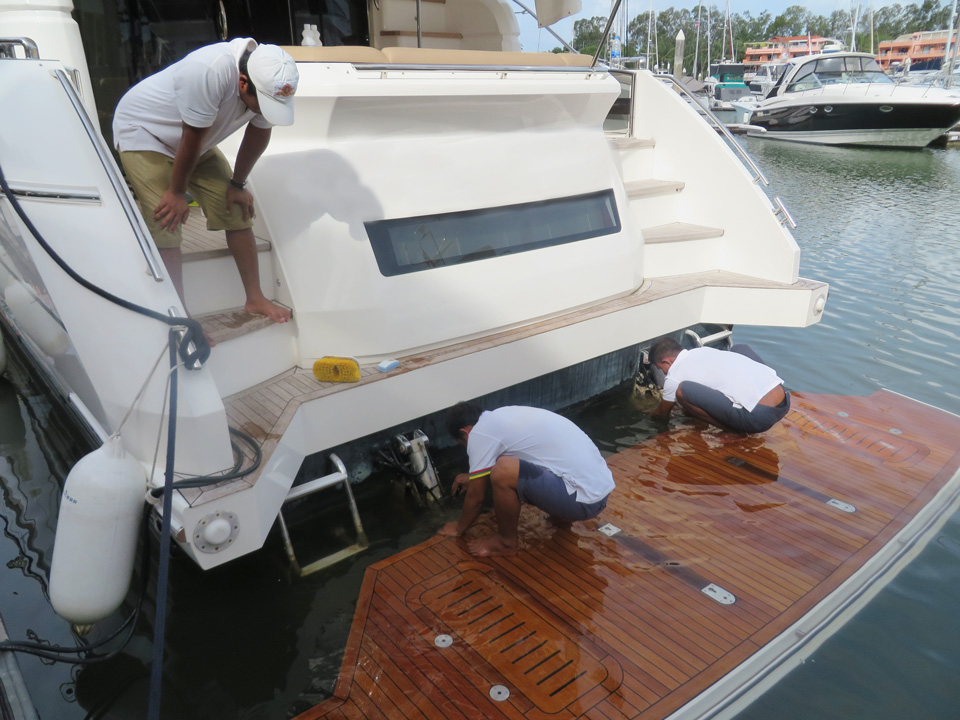 Yacht crew training. Checking underwater gear